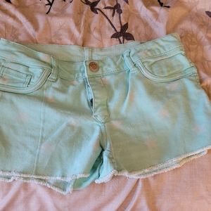 4/$10 Sale! Size 7 Flip side reversible stars shorts
